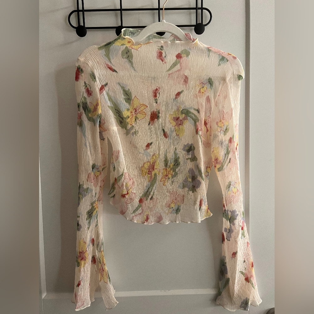 Sheer blouse, local brand
